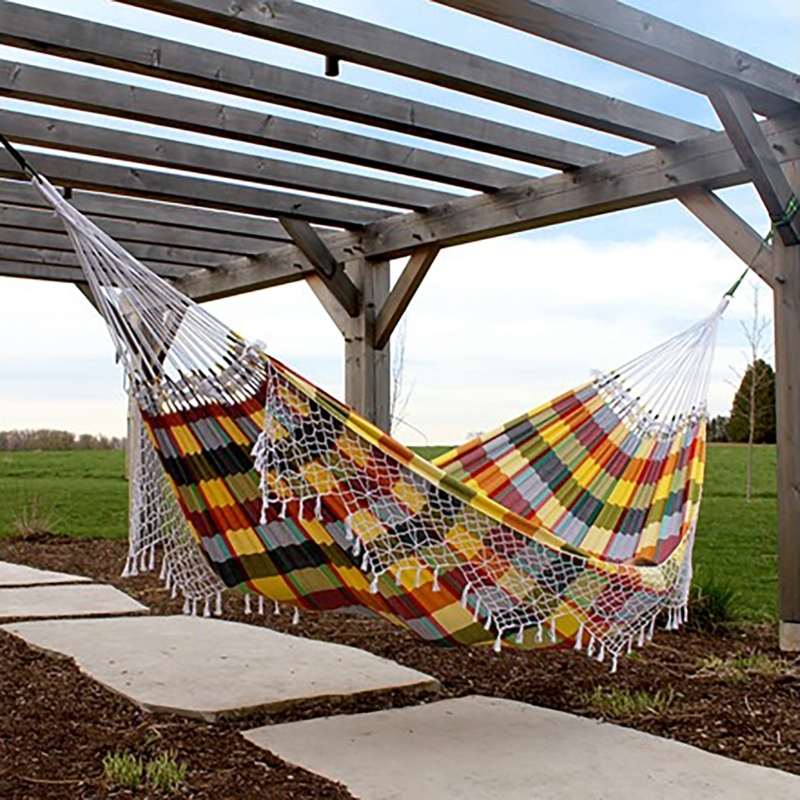 Woven Fabric Hammock on Freestanding Base for Tropical Patio