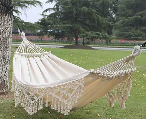 Woven Hammock with Macrame Fringe and Spreader Bars in Off White