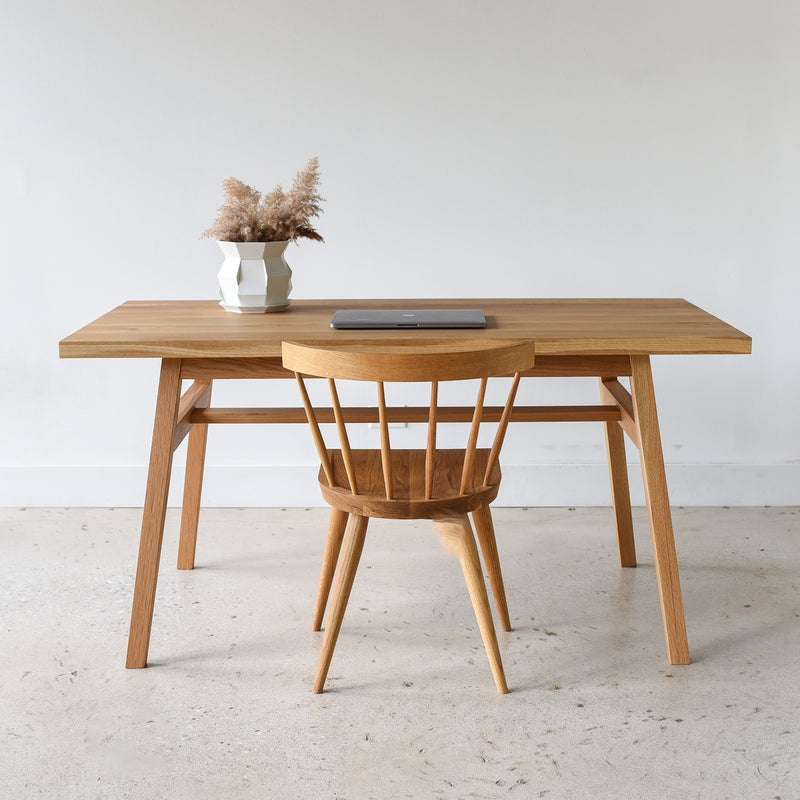 Writing Desk with Angled Trestle Base and Slim Integrated Drawers.