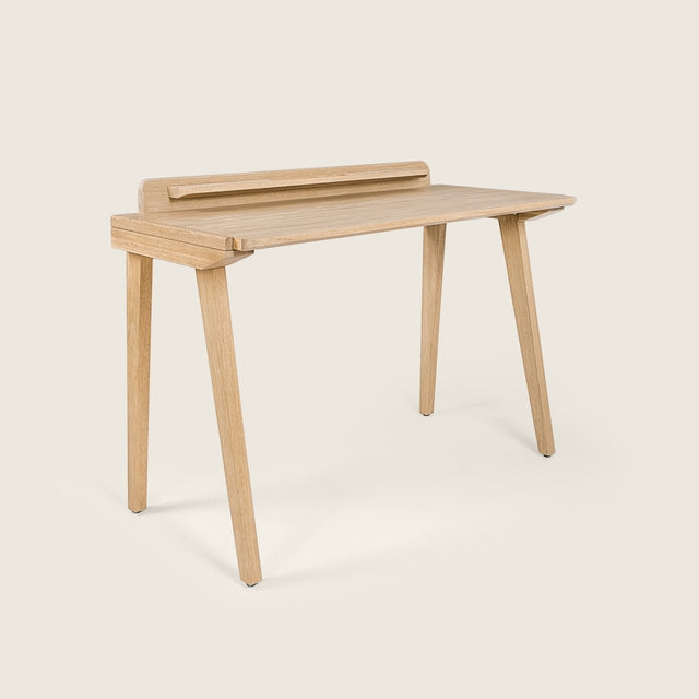 Writing Desk with Light Oak Finish, Integrated Pulls, and Tapered Legs.