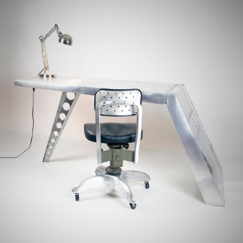 Writing Desk with Wing Shaped Top and Patchwork Metal Surface with Rivets