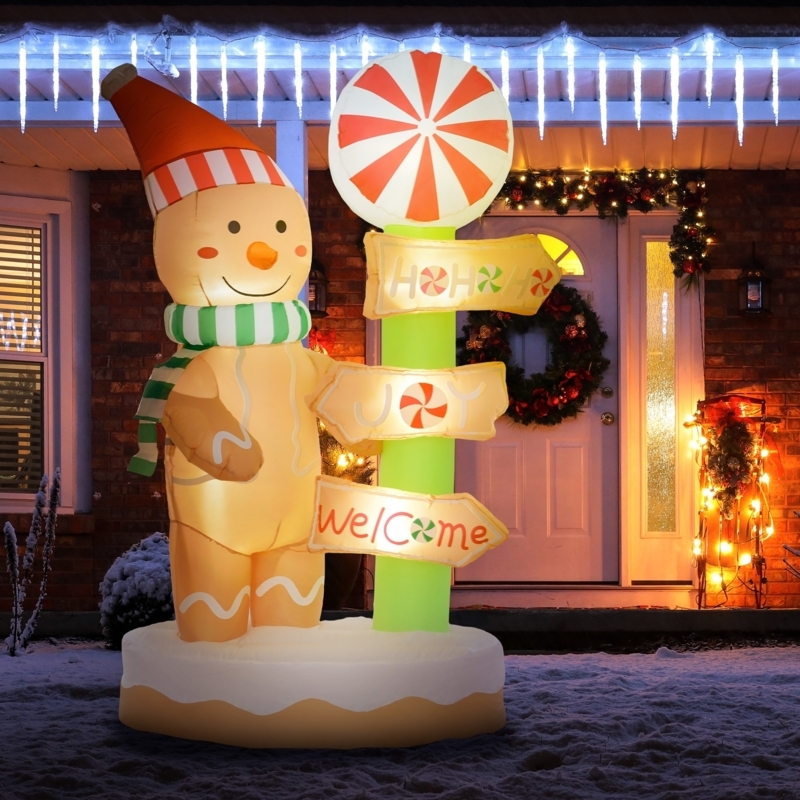 6ft Holiday Inflatable Gingerbread Man with North Pole Signpost Detail