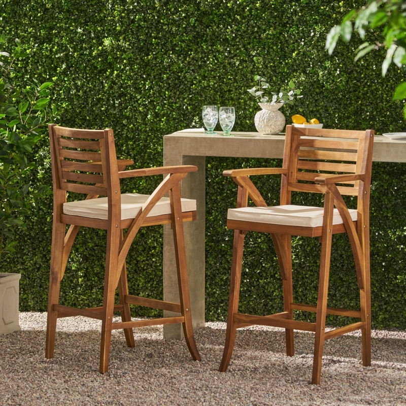 Bar Stool crafted from Wood Toned Material with Slat Back Design