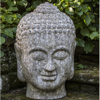 Buddha Head Statue Pitted Texture Weathered Stone Meditative Sculpture