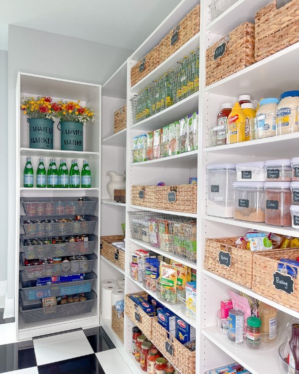 Built-In Pantry Shelving with Rolling Ladder and Uniform Glass Jars