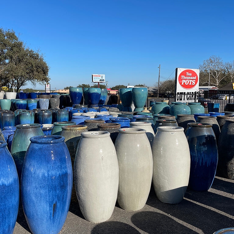Ceramic Planter Display featuring Glossy Glaze and Diverse Colors.