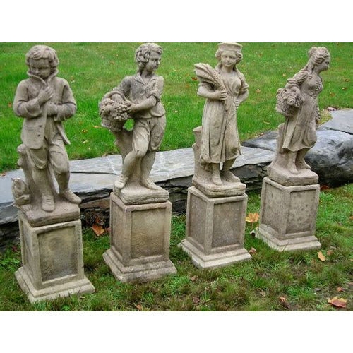 Classical Garden Statue Set with Aged Stone Patina and Seasonal Theme