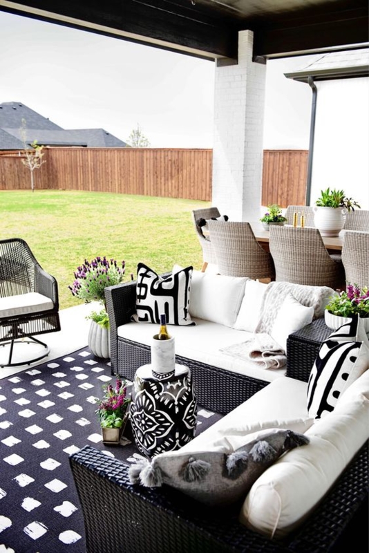 Coastal Wicker Patio Chair with Botanical Patterned Cushions