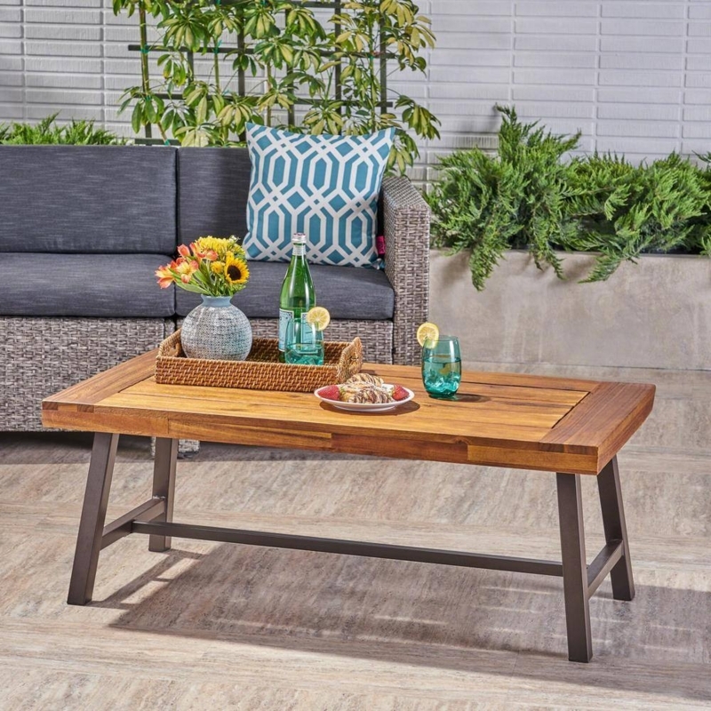 Coffee Table with Thick Cylindrical Legs, Lower Shelf and Natural Wood Grain