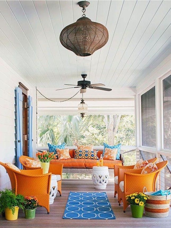 Colorful Outdoor Patio Decor Ideas with Teal Metal Folding Chairs