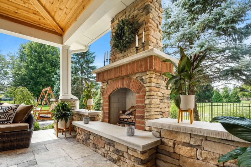 Contemporary Outdoor Fireplace with Monolithic Chimney on Deck