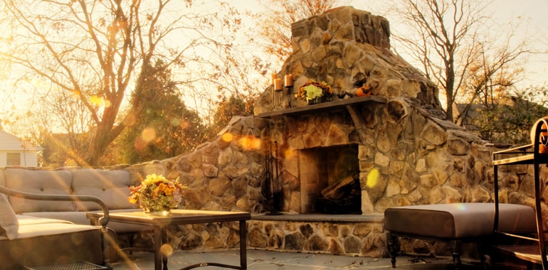 Contemporary Wood Burning Fireplace with Stacked Stone Cladding