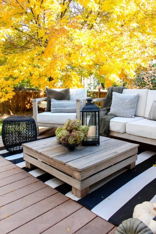 Cozy L-Shaped Outdoor Sectional Fall Themed Patio Decor