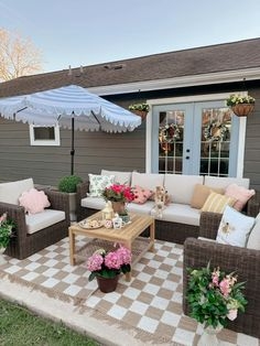 Cozy Patio Sectional with Fire Pit and Red Accent Pillows