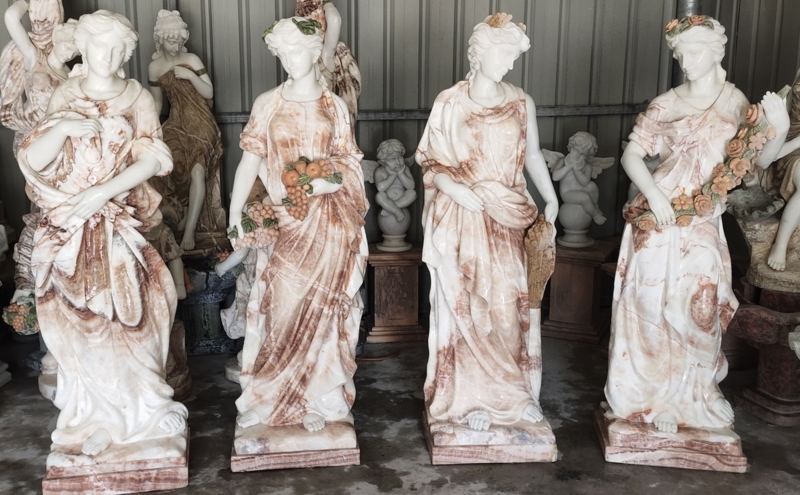 Cream Stone-like Sculpture Set on Integrated Circular Pedestals