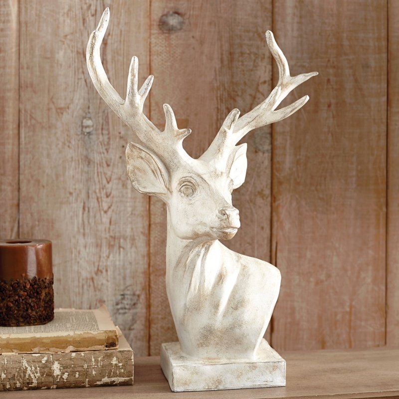 Deer Sculpture featuring a shield crest design and antique bronze finish.