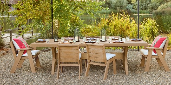 Dining Table Wood Trestle Base Woven Chairs Stone Patio Setting