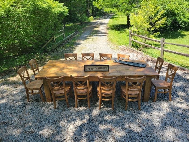 Farmhouse Dining Table with Distressed Plank Surface