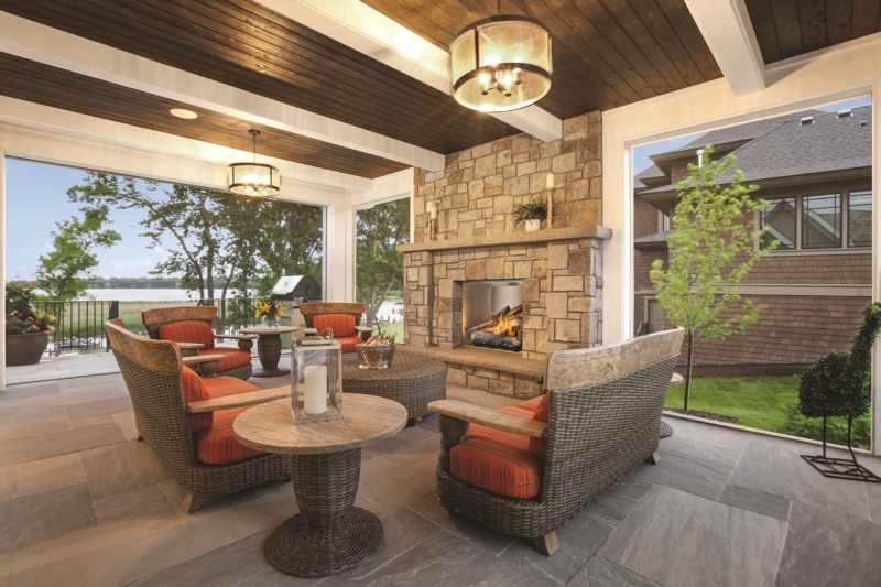 Fireplace Arched Opening Floor to Ceiling Stone Built-In Shelving