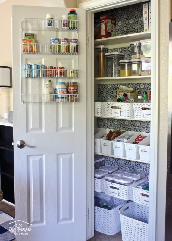 Floor-to-Ceiling Pantry Shelving with Uniform Labeled Storage Bins