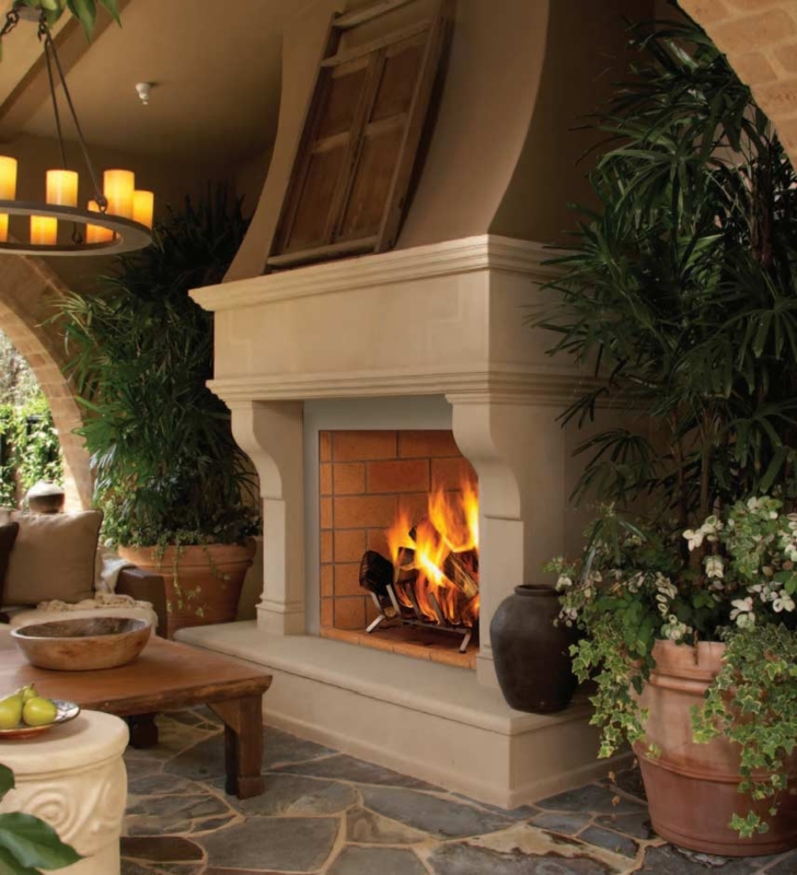 Floor-to-Ceiling Stone Fireplace with Integrated Media Wall