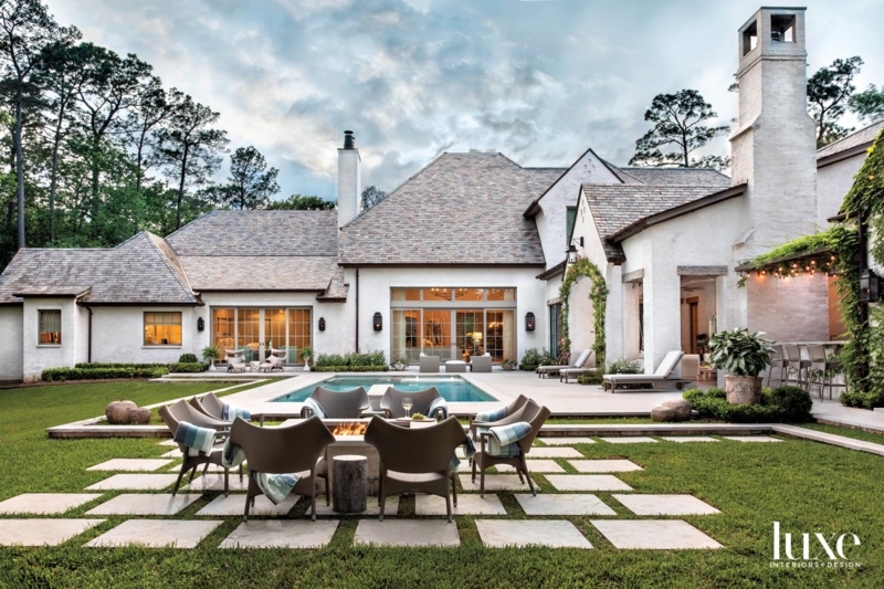 Floor-to-Ceiling Stone Fireplace with Vaulted Wood Ceiling Patio