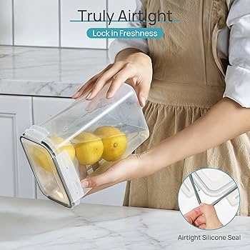 Food Storage Container Set with Side Locking Lids and Black Tops.