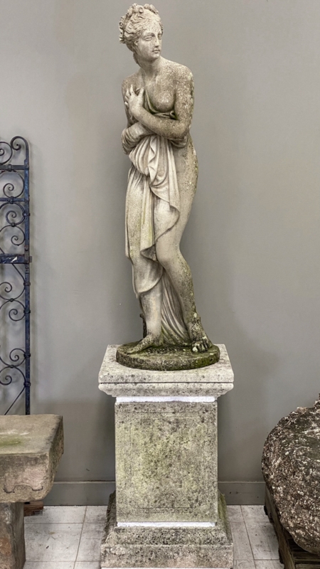 Garden Statue on Tall Paneled Pedestal, Weathered Stone Like Finish