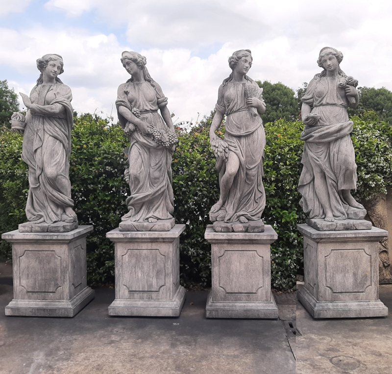 Garden Statue Set: Carved Limestone Four Seasons Figures with Weathered Patina