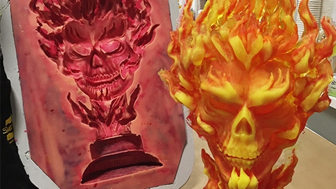 Gothic Resin Skull Sculpture with Translucent Orange Flames