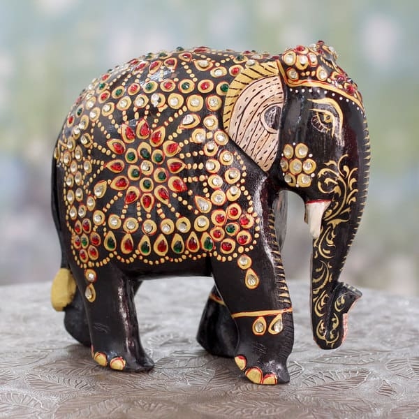 Hand-Carved Wood Elephant Figurine with Floral Details