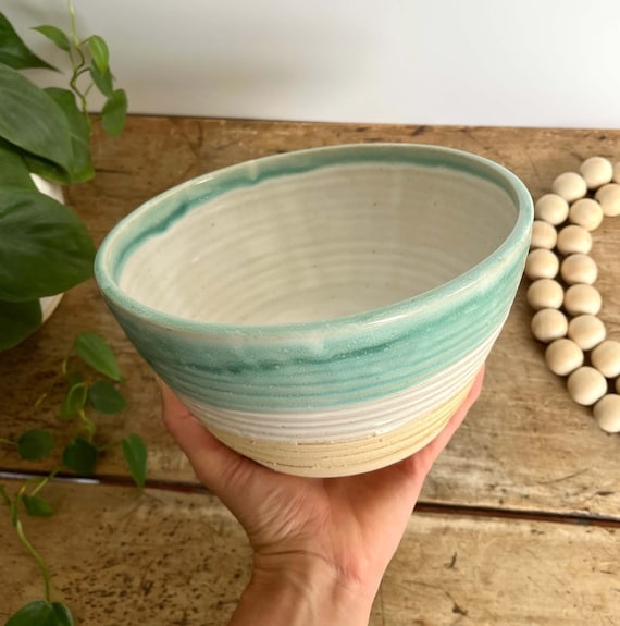 Handmade Pottery Serving Bowl with Teal Spiral Glaze & Raw Exterior
