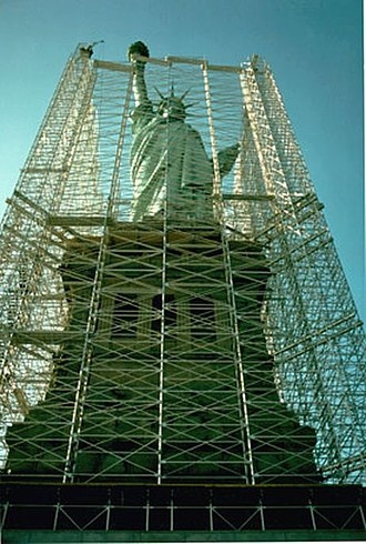 Historical Copper Statue Head, Verdigris Patina in Industrial Scaffolding.
