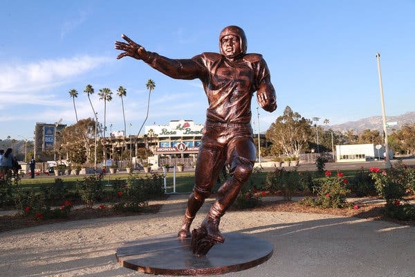 Large Baseball Pitcher Sculpture in Industrial Artist Studio