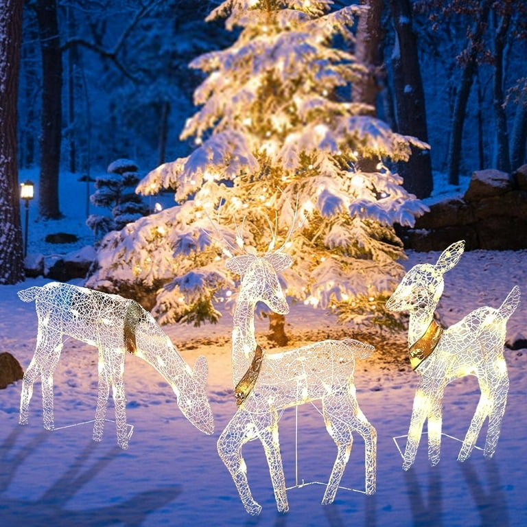 Lighted Display: Gold Wireframe Family Set with Festive Pinecone Accents.