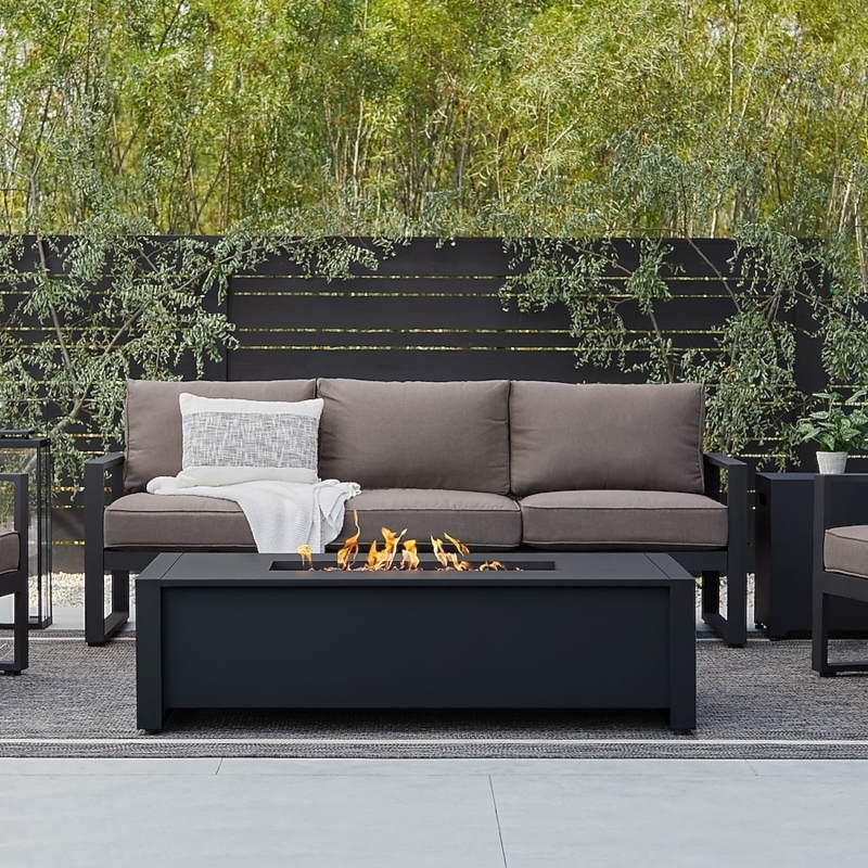 Matte Black Linear Fire Pit Table, Glass Wind Guard, Lava Rocks.