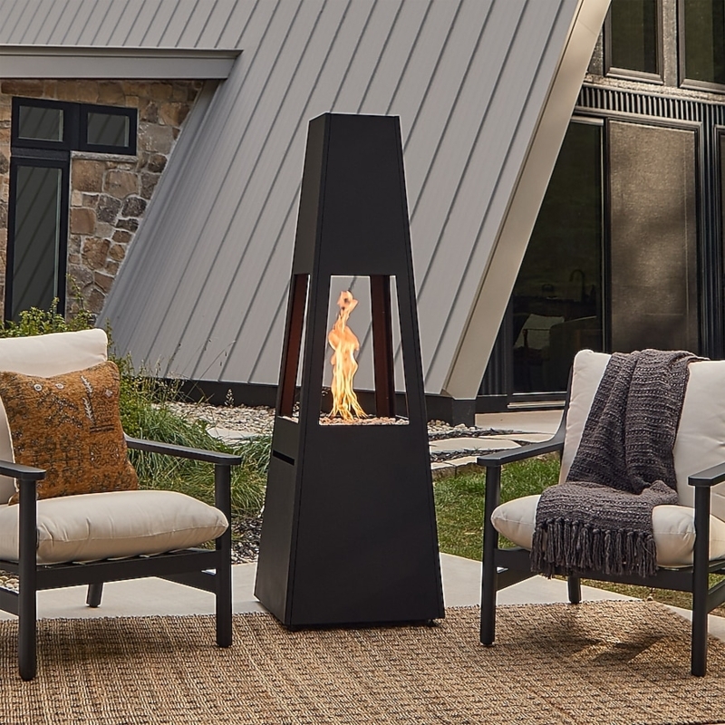Matte Black Metal Chiminea, 70 Inch Tapered Form, Sleek Vertical Heating.