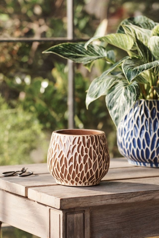 Matte White Ceramic Planter with Vertical Ridges, Ribbed Texture.
