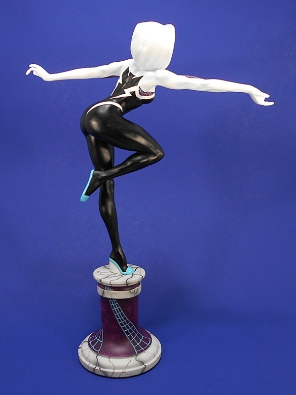 Modern Collectible Statue, Crouching Superhero on Urban Rubble Base.