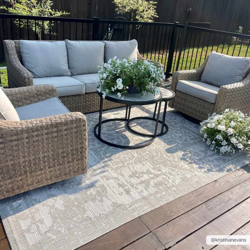 Modern Farmhouse Deck Styling with Beige Geometric Weave Area Rug