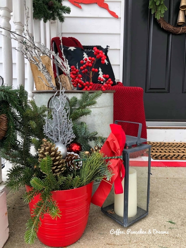 Modern Farmhouse Porch Decor featuring Black Spindle Chair and Birch