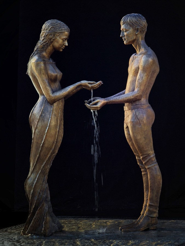 Modern Garden Fountain with Abstract Human Figures and Tiered Water Flow.