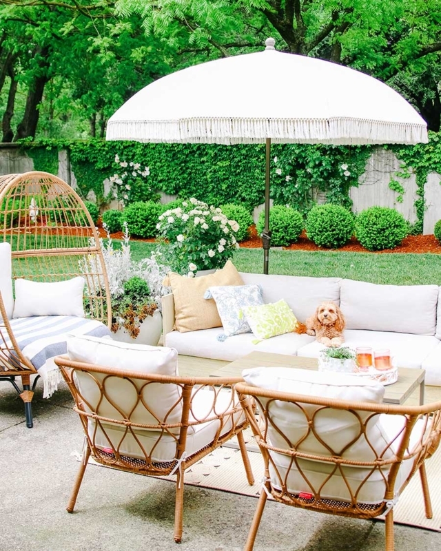 Modern Glam Patio Styling with L-Shaped Sectional and Pink Accents