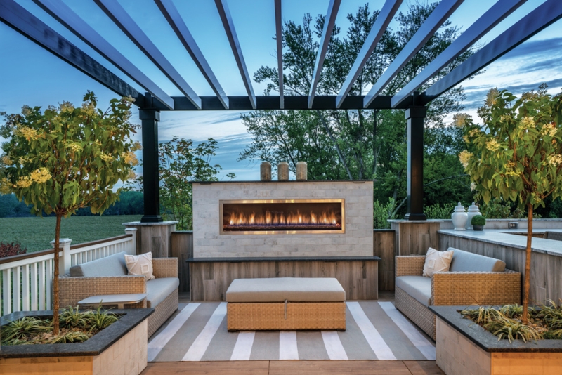 Modern Linear Fireplace with Stone-Tiled Surround near Large Windows