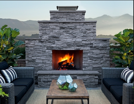 Modern Outdoor Fireplace, Tall Stone-Like Cladding, Black Contrast Frame.