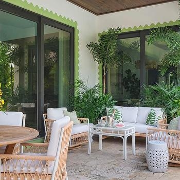 Modern Outdoor Swivel Chair with White Frame and Tan Upholstery Cushions