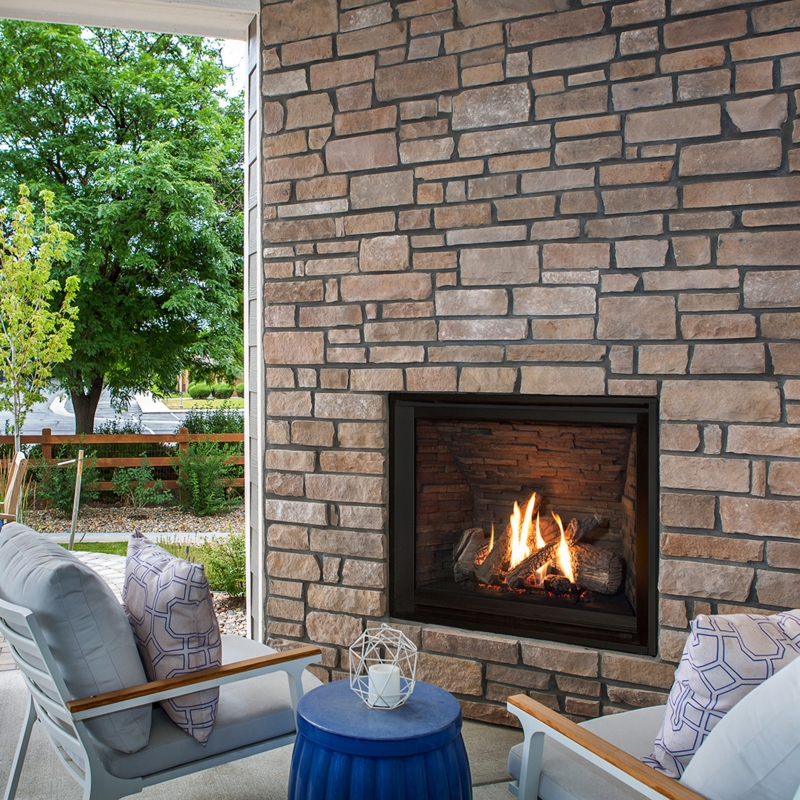 Modern Patio Fireplace Feature with Ledgestone Surround and 1 Inch Trim