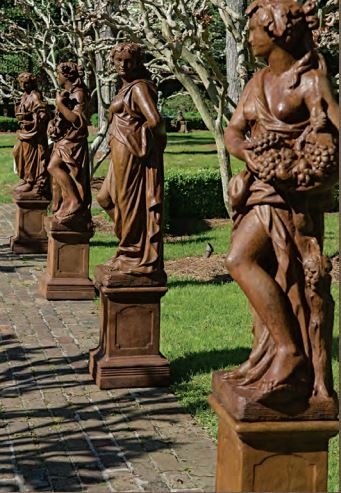 Off-White Garden Statue Set Mounted on Tall Weathered Pedestals