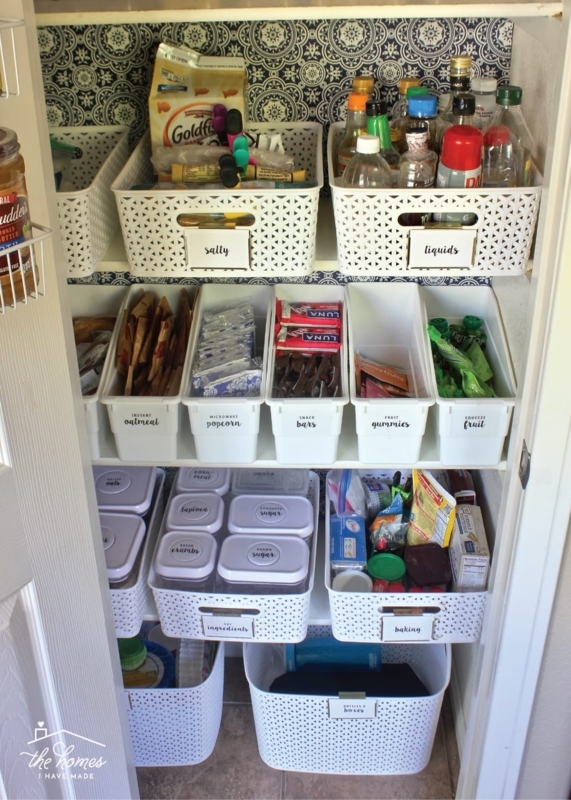 Organized Walk-In Pantry System with Color-Coordinated Blue Bins