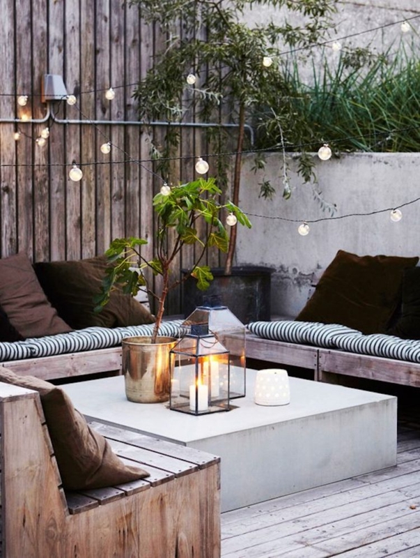 Outdoor Dining Set Festoon String Lights Slat Back Chairs Wood Table